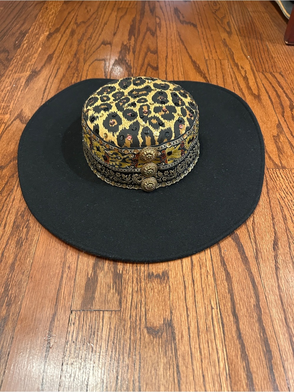 Whittall & Shon Black Wide-Brim Hat with Gold Leopard Crown